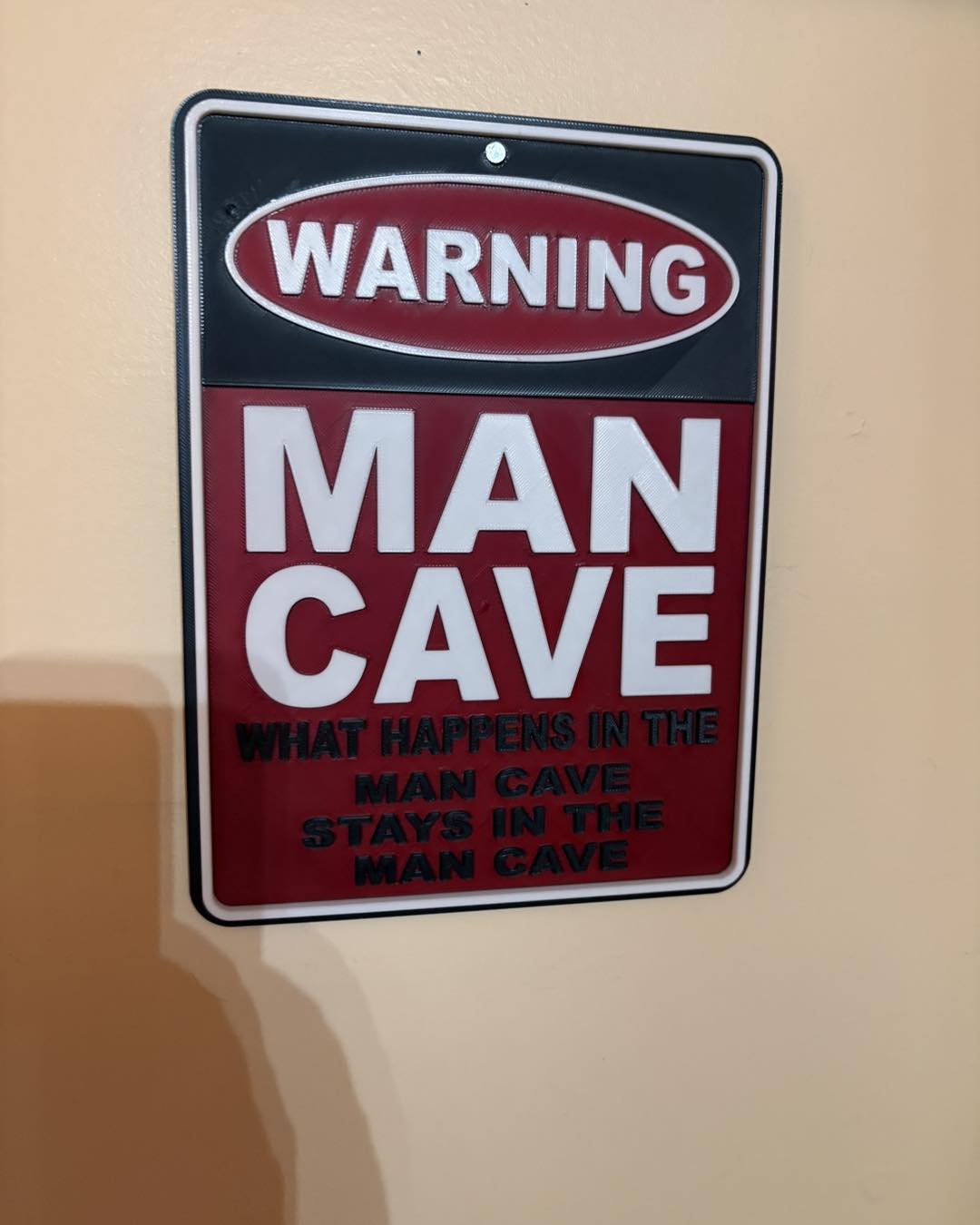 What happens in the Man Cave… STAYS in the Man Cave Wall Sign